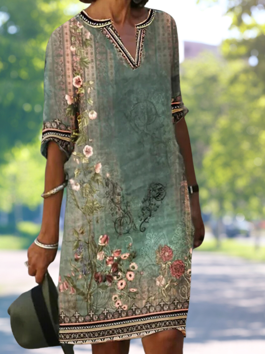 LP | Abito midi verde con scollo a V e motivo floreale