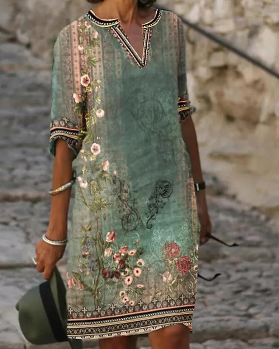 LP | Abito midi verde con scollo a V e motivo floreale