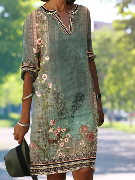 LP | Abito midi verde con scollo a V e motivo floreale